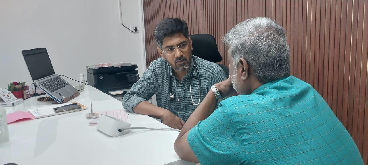 Dr. Hanushraj with Patient